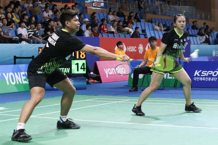 Praveen Jordan/Melati Daeva Oktavianti saat beraksi pada babak perempat final Korea Open 2019, Jumat (27/9/2019)