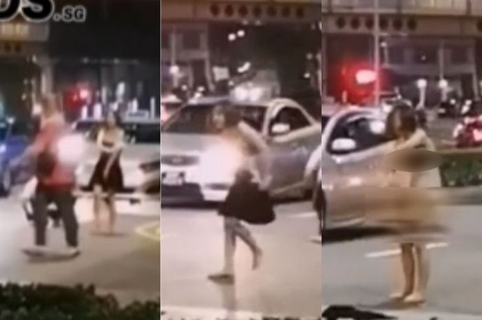 Gadis nekat buka baju di tengah jalan raya