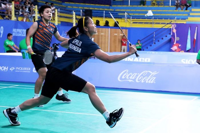 Pebulu tangkis Indonesia, Greysia Polii/Apriyani Rahayu saat beraksi pada babak semifinal bulu tangkis perorangan SEA Games 2019, di Muntinlupa Sports Complex, Filipina, Minggu (8/12/2019).