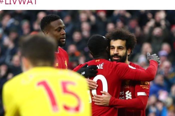 Penyerang Liverpool, Mohamed Salah (kanan), merayakan gol yang dicetak ke gawang Watford dalam laga Liga Inggris di Stadion Anfield, Sabtu (14/12/2019).