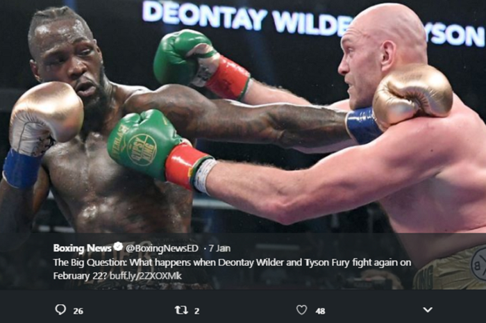 Juara kelas berat WBC Deontay Wilder (kiri) menghadapi Tyson Fury dalam pertandingan di T-Mobile Arena, Nevada, Amerika Serikat, 1 Desember 2018.