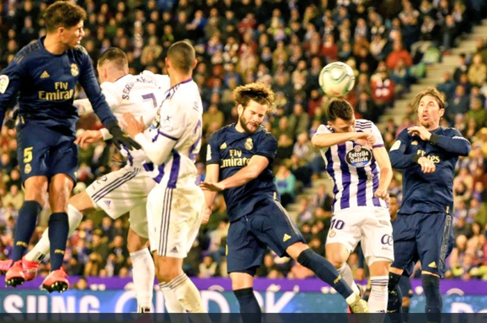 Aksi Nacho (Tengah) saat mencetak gol kemenangan Real Madrid atas Real Valladolid di pekan ke-21 Liga Spanyol, Minggu (26/1/2020) waktu setempat atau Senin dini hari WIB.