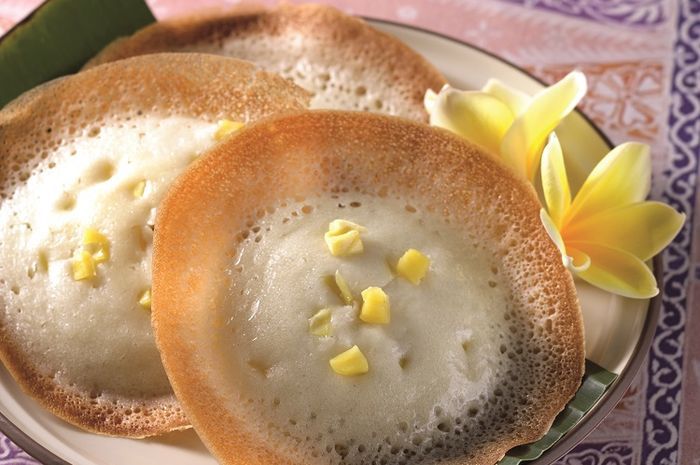 Learn to make a simple yet scrumptious Kue Serabi Ceylon (rice flour pancake with jackfruit) at home with this step-by-step recipe!