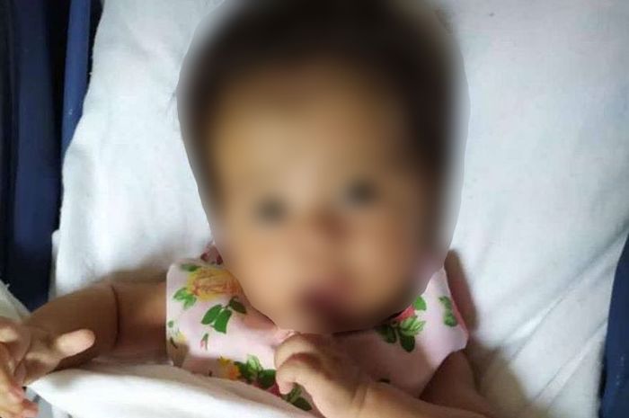 Seorang bayi perempuan berusia 6 bulan dimutilasi oleh orangtuanya dan dibuang ke dalam sumur.