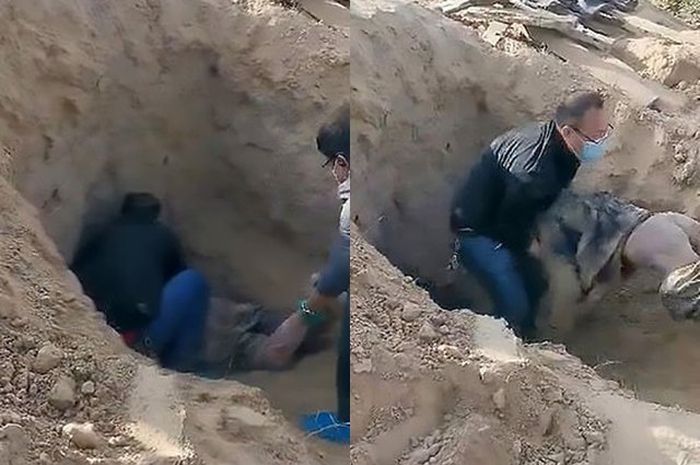 Orang-orang mencoba membongkar makam itu,