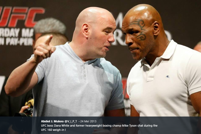 Presiden UFC, Dana White (kiri) bersama legenda tinju dunia, Mike Tyson (kanan).