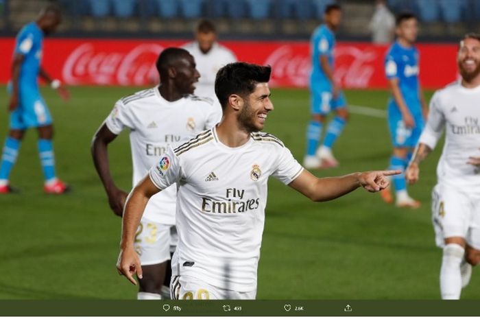 Penyerang Real Madrid, Marco Asensio, merayakan golnya ke gawang Valencia dalam laga di Stadion Alfredo Di Stefano, Kamis (18/6/2020).