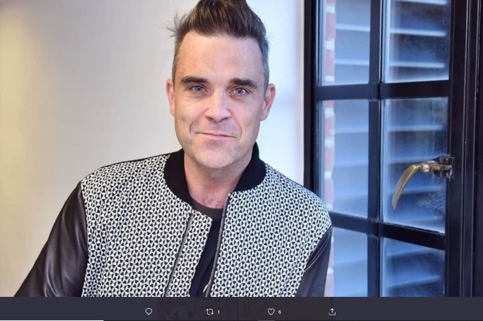 Penyanyi asal Inggris, Robbie Williams.