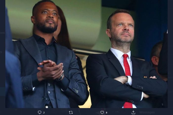 Eks pemain Manchester United, Patrice Evra (kiri), bersama Ed Woodward.