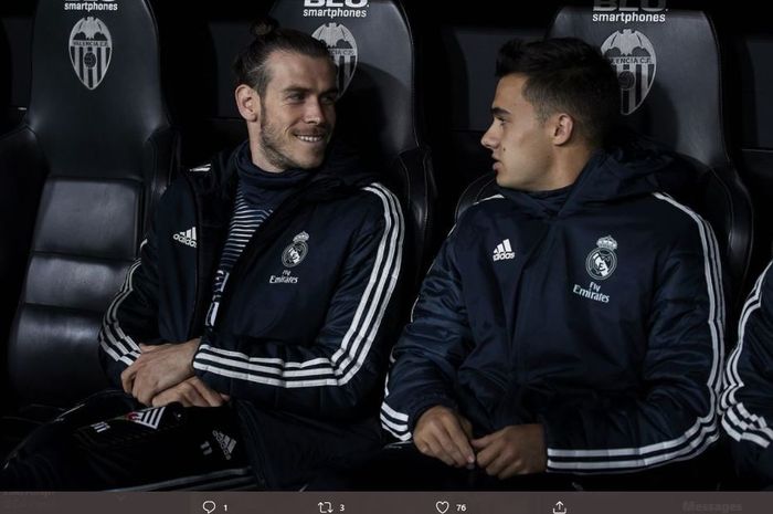 Gareth Bale dan Sergio Reguilon saat duduk di bench dalam laga Real Madrid.