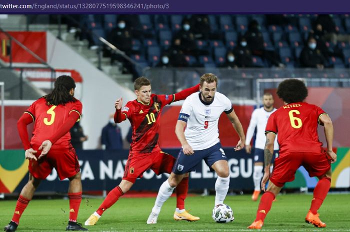 Pemain timnas Inggris, Harry Kane, berada di tengah pengawalan para pemain timnas Belgia dalam laga kelima Liga A Grup 2 UEFA Nations League 2020-2021, Minggu (15/11/2020) waktu setempat atau Senin pukul 02.45 WIB.