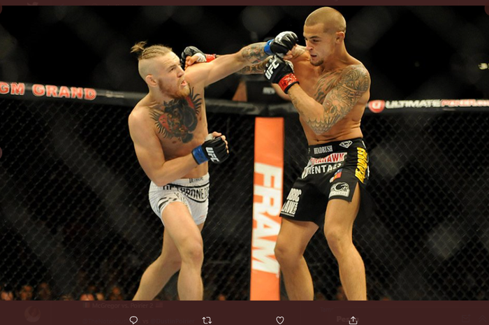 Ketika Conor McGregor (kiri) dan Dustin Poirier (kanan) saling bertarung pada ajang UFC 178, September 2014.