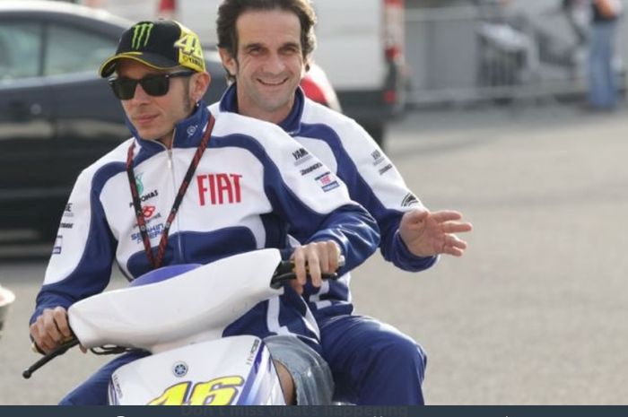 Valentino Rossi dan manajer tim FIAT Yamaha, Davide Brivio.