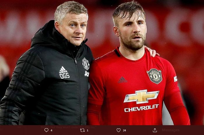 Pelatih Manchester United, Ole Gunnar Solskjaer, dan bek sayap Luke Shaw.