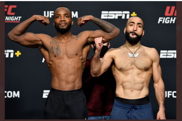 Petarung kelas welter, Leon Edwards (kiri) dan Belal Muhammad (kanan) saling berpose sebelum bertarung pada ajang UFC Vegas 21, Minggu (14/3/2021).