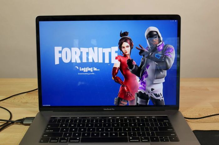 Illustration of playing the game Fortnite on Macbook