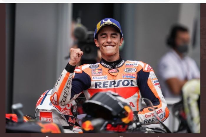 Pembalap Repsol Honda, Marc Marquez, ketika merayakan kemenangan MotoGP Jerman di Sachsenring, Minggu (20/6/2021).