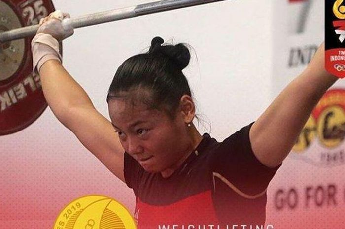 Lifter putri Indonesia, <a href='https://manado.tribunnews.com/tag/windy-cantika-aisah' title='Windy&nbsp;Cantika&nbsp;Aisah'>Windy&nbsp;Cantika&nbsp;Aisah</a>, saat berhasil meraih medali emas di SEA Games 2019.