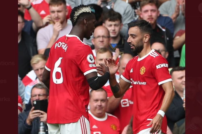 Dua pilar Manchester United, Paul Pogba (kiri) dan Bruno Fernandes (kanan), mencetak rekor langka dalam laga Liga Inggris kontra Leeds United, Sabtu (14/8/2021) malam WIB.