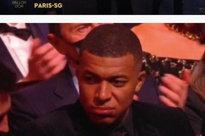 Ekspresi Kylian Mbappe saat Lionel Messi diumumkan sebagai pemenang Ballon d'Or 2021.