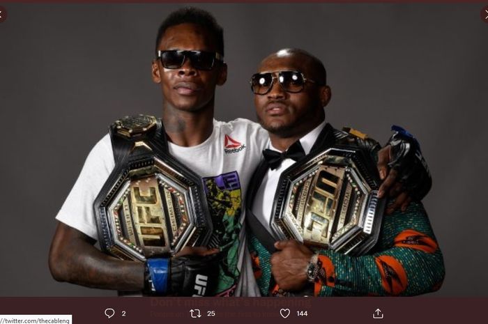 Juara kelas menengah UFC, Israel Adesanya, dan juara kelas welter, Kamaru Usman.