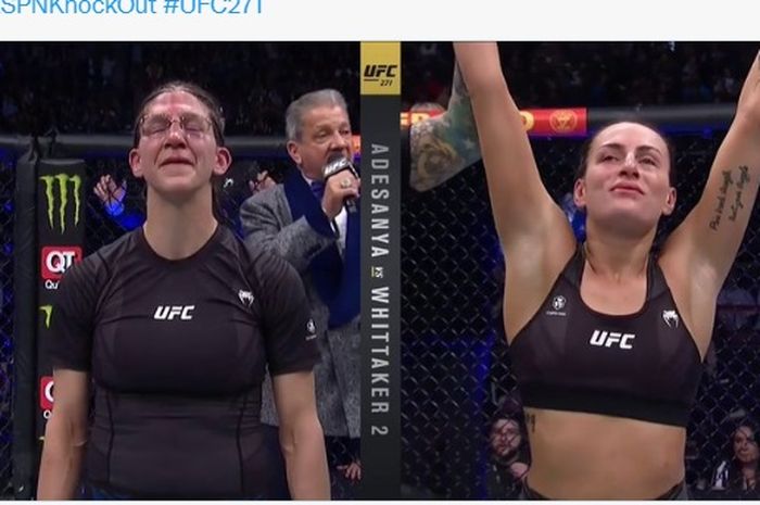 Momen jagoan veteran, Roxanne Modaferri (kiri) dinyatakan kalah angka dari Casey O'Neill (kanan) pada UFC 271 (13/2/2022).