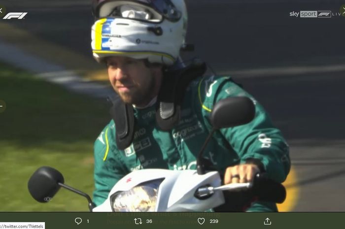 Pembalap Aston Martin, Sebatian Vettel, dihukum gegara mengendarai motor di lintasan setelah sesi latihan bebas pertama Formula 1 GP Australia di Sirkuit Melbourne, Australia, 8 April 2022.