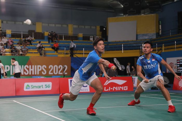 Aksi ganda putra Indonesia, Pramudya Kusumawardana/Yeremia Erich Yoche Yacob Rambitan pada babak kedua Kejuaraan Asia 2022