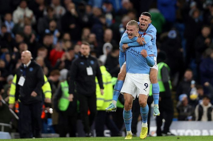 Striker Manchester City, Erling Haaland, merayakan gol ke gawang Fulham dalam laga Liga Inggris di Stadion Etihad, Sabtu (5/11/2022).