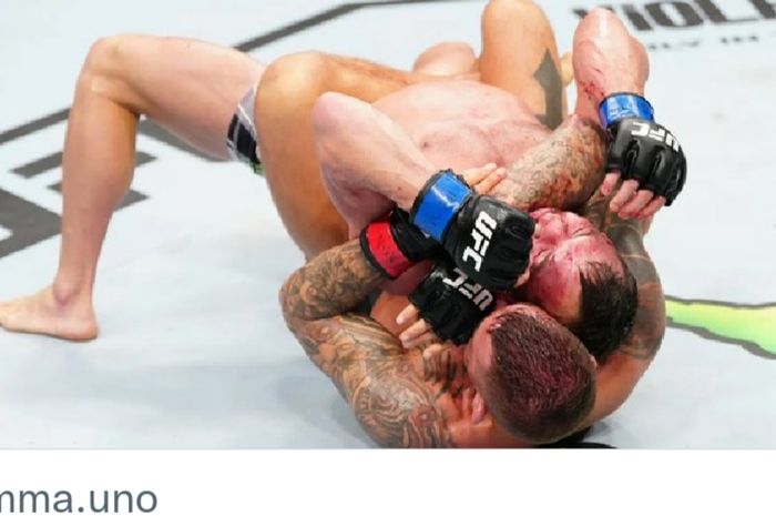 Dustin Poirier mengalahkan Michael Chandler dengan kuncian di ronde ketiga dalam hasil UFC 281, Minggu (13/11/2022) WIB. 