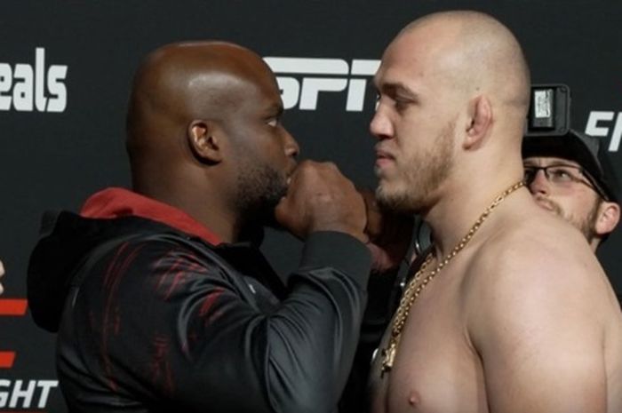 Derrick Lewis (kiri) batal bertarung dengan Sergey Spivak di UFC Vegas 65, Minggu (20/11/2022), karena jatuh sakit di hari H.