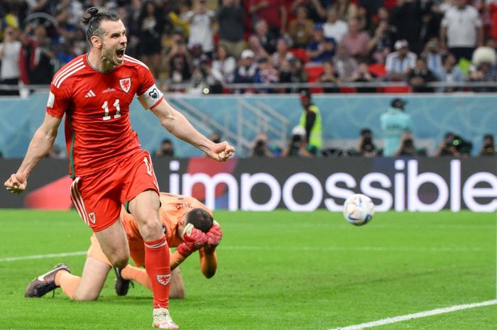 Gareth Bale merayakan gol dalam laga timnas AS vs Wales pada duel Grup B Piala Dunia 2022 di Ahmad bin Ali Stadium (21/11/2022).