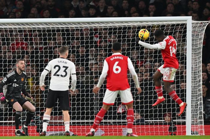  Eddie Nketiah mencetak dua gol bagi Arsenal dalam kemenangan 3-2 atas Manchester United di Emirates Stadium, Minggu (22/1/2023) malam WIB.