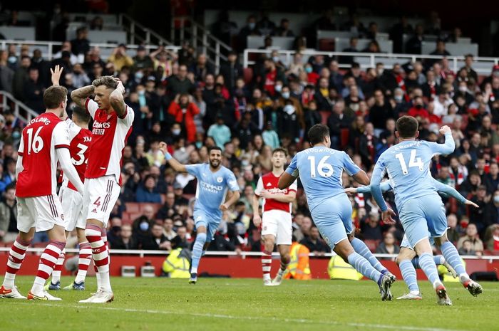 Rodri (16) cetak gol penentu kemenangan Manchester City atas Arsenal pada bentrokan terakhir mereka di Liga Inggris (1/1/2022). Arsenal selalu kalah dalam 10 duel terakhir melawan Man City.