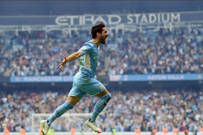 Selebrasi gelandang Manchester City, Ilkay Guendogan, usai menjadi supersub dengan mencetak brace pada laga pamungkas penentu gelar juara Man City pada musim 2021-2022.
