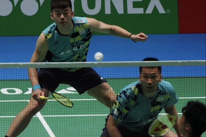 Pasangan ganda putra Taiwan, Lee Yang/Wang Chi Lin, pada final Japan Open 2023 di Yoyogi National Gymnasium, Minggu (30/7/2023).