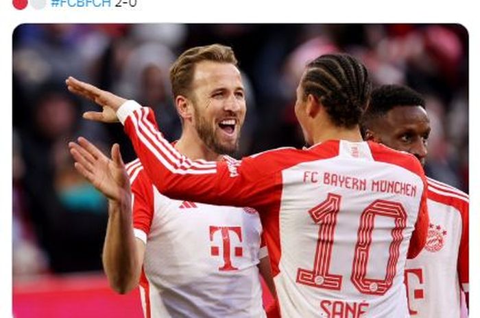 Harry Kane merayakan gol yang ia cetak ke gawang Heidenheim bersama Leroy Sane.