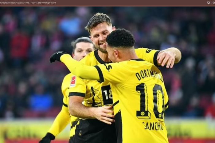 Jadon Sancho merayakan gol bersama Niclas Fuellkrug dalam laga FC Koeln vs Borussia Dortmund di ajang Bundesliga 2023-2024, Sabtu (20/1/2024).