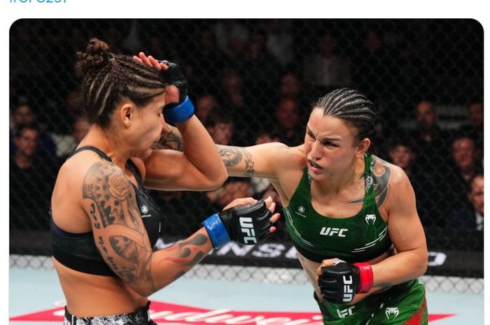 Raquel Pennington (kanan) mengalahkan Mayra Bueno Silva di UFC 297, Minggu (21/1/2024) WIB di Toronto, untuk menjadi juara baru kelas bantam perempuan. 