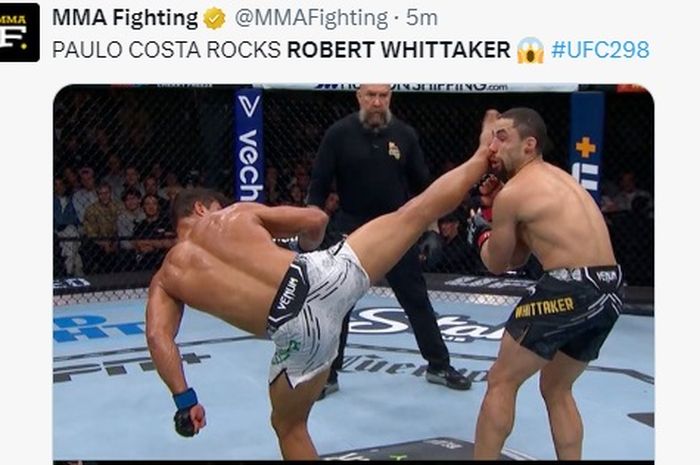 Robert Whittaker menerima tendangan berputar dari Paulo Costa di UFC 298, Minggu (18/2/2024) WIB di Anaheim, California, Amerika Serikat.