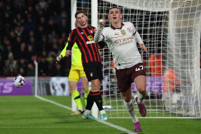 Gelandang Man City, Phil Foden, merayakan gol ke gawang Bournemouth pada laga pekan ke-26 Liga Inggris di Stadion Vitality, Sabtu (24/2/2024).