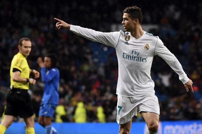 Cristiano Ronaldo merayakan gol yang dicetaknya untuk Real Madrid dalam laga Liga Spanyol melawan Getafe, 3 Maret 2018 di Santiago Bernabeu.
