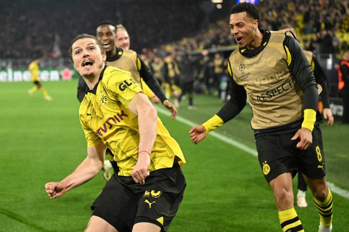 Marcel Sabitzer merayakan gol untuk Borussia Dortmund ke gawang Atletico Madrid pada duel Liga Champions di Signal Iduna Park (16/4/2024).