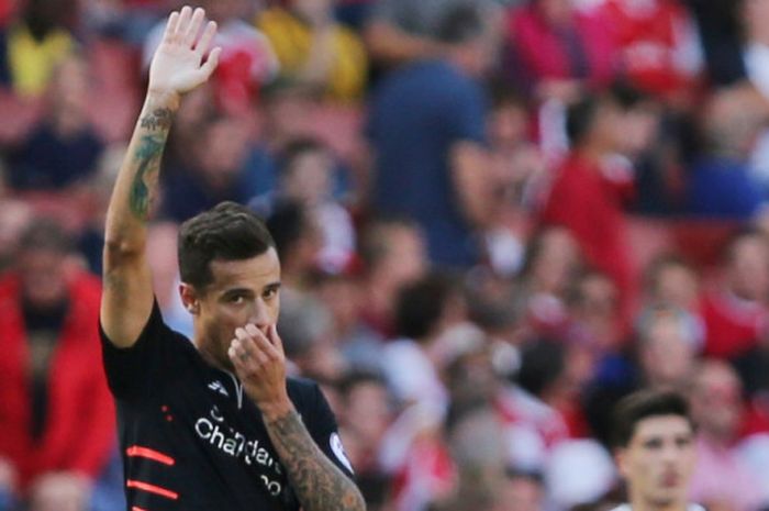 Reaksi Philippe Coutinho saat merayakan gol untuk Liverpool ke gawang Arsenal dalam duel Liga Inggris di Stadion Emirates, London, 14 Agustus 2016.
