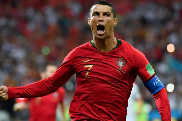           Penyerang Portugal, Cristiano Ronaldo, merayakan golnya ke gawang Spanyol dalam laga Grup B Piala Dunia 2018, Jumat (15/6/2018) di Stadion Fisht, Sochi.          