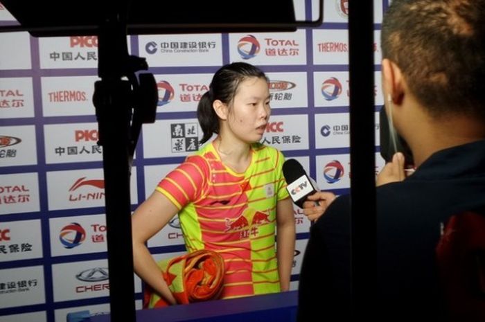 Tunggal putri China, Li Xuerui, usai menang 14-21, 21-13, 21-10 atas peman andalan Korea Selatan, Su