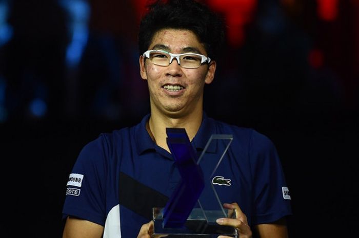 Petenis putra Korea Selatan, Chung Hyeon, melakukan selebrasi setelah menjadi juara Next Gen ATP Finals pertama. Chung menjadi juara setelah mengalahkan Andrey Rublev (Rusia) pada babak final yang berlangsung di Fiera Milano, Milan, Italia, Sabtu (11/11/2017) malam waktu setempat.