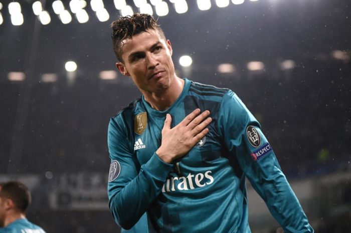  Megabintang Real Madrid, Cristiano Ronaldo, merayakan gol yang dicetak ke gawang Juventus dalam laga leg pertama perempat final Liga Champions di Stadion Allianz, Turin, Italia pada 3 April 2018. 