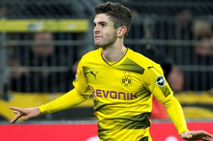 Gelandang Borussia Dortmund, Christian Pulisic, merayakan gol yang dia cetak ke gawang Hoffenheim da