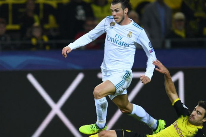 Bintang Real Madrid, Gareth Bale, dalam laga kontra Borussia Dortmund di Signal Iduna Park, Selasa (26/9/2017)